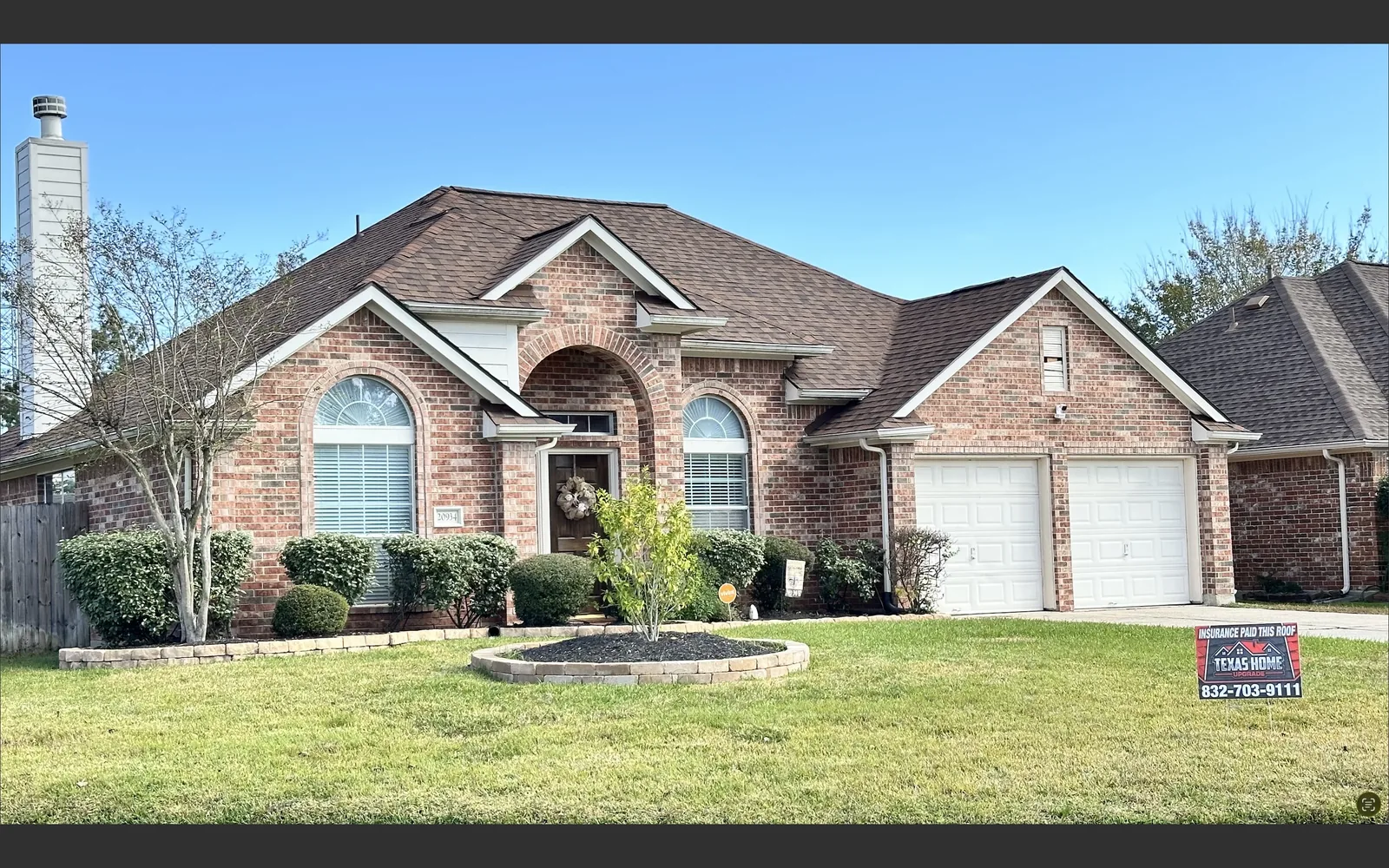 Brick home with a multi-slope roof
