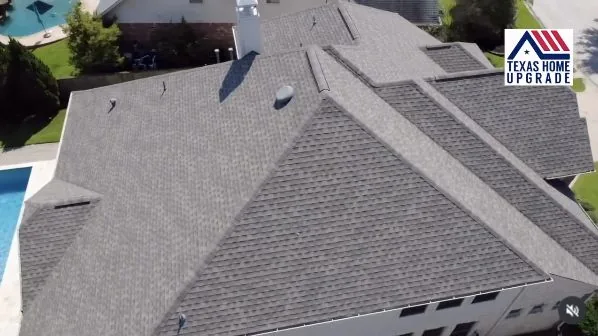 Shingle roof with multiple slopes and ridgelines